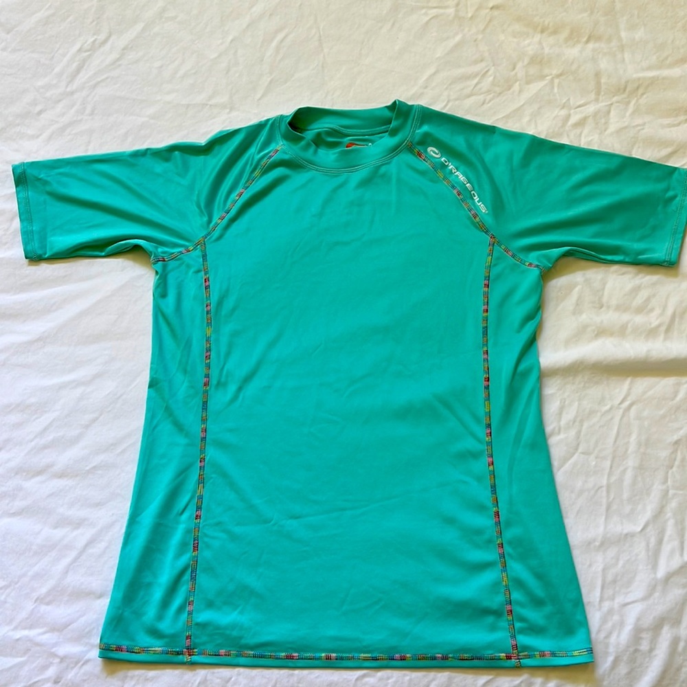Teal green swim shirt. Children’s XL(16)
